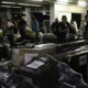 Cubanos, vinculados ao Mais Médicos, embarcam em Brasília para Havana no Aeroporto Internacional de Brasília. Foto: Fabio Rodrigues Pozzebom/Agência Brasil